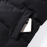 Men's beige fleece vest featuring an insulated collar and pockets, displayed against a neutral background.