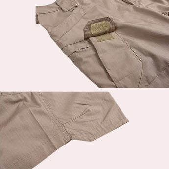 Men's beige lightweight cargo shorts with multiple pockets, showcasing their durable and utility-focused design.