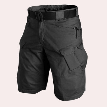 Men's black lightweight cargo shorts featuring durable multi-pocket design, showcasing utility fashion with a focus on comfort and style.
