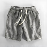 Men's gray linen drawstring shorts, lightweight and breathable, size 2XL, eco-friendly material.