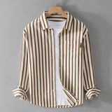 Men's beige long sleeve shirt with vertical stripes, featuring a classic collar and button-down style, displayed on a clothes hanger.