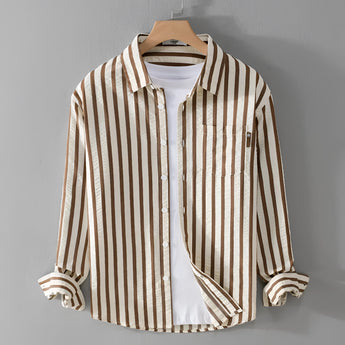 Men's beige long sleeve shirt with vertical stripes, featuring a classic collar and button-down style, displayed on a clothes hanger.