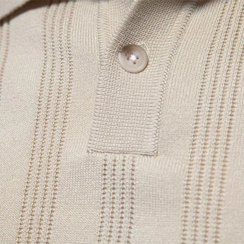 Men's beige vertical stripe short sleeve polo made of ribbed cotton, featuring a collar and button details.