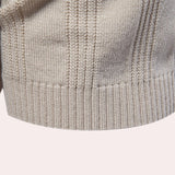 Men's beige short sleeve polo shirt with vertical stripes, featuring a ribbed cotton texture and a classic collar.
