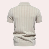 Men's beige short sleeve polo shirt with vertical stripes and a ribbed cotton texture, featuring a collar and button details.