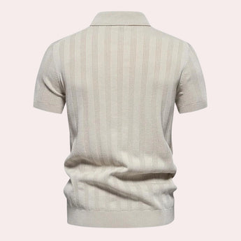 Men's beige short sleeve polo shirt with vertical stripes and a ribbed cotton texture, featuring a collar and button details.