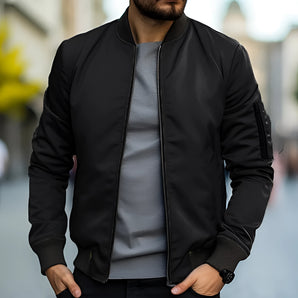 Men's black bomber jacket in a lightweight design, featuring a classic urban streetwear style. The jacket shown is in the "Nero" color and size 5XL, highlighting details such as the sleeve, shoulder, and waist.
