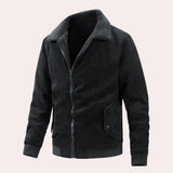 Men's black corduroy bomber jacket featuring ribbed cuffs, a collar, and pocket details, with a durable and warm design.