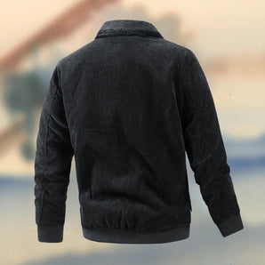Men's black corduroy bomber jacket with ribbed cuffs and a durable design, featuring a collar and full-length sleeves.