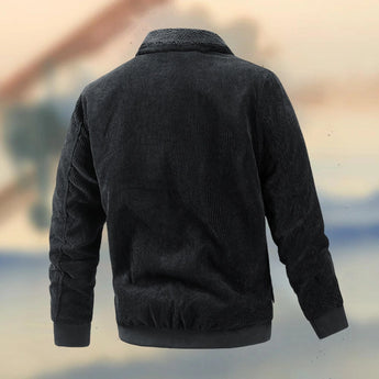 Men's black corduroy bomber jacket with ribbed cuffs and a durable design, featuring a collar and full-length sleeves.