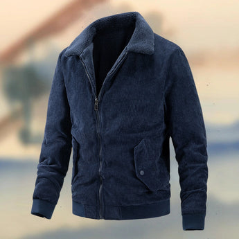 Men's blue corduroy bomber jacket with ribbed cuffs, featuring a collar and long sleeves, suitable for warm and durable outerwear.