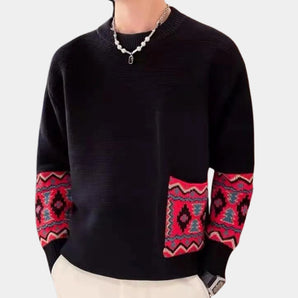 Men's black crewneck sweater featuring ethnic pattern sleeves with intricate design, showcasing a blend of traditional and contemporary style, made from soft textile material.