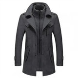 Men's gray double-breasted trench coat, size 2XL, featuring a stylish design with a collar, buttons, and belt, offering a sleek fashion look with long sleeves, made from waterproof material.