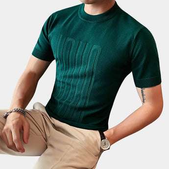 Men's green designer style t-shirt in size 3XL featuring an embossed logo, ribbed cuffs, and a comfortable fit displayed on a mannequin or model.