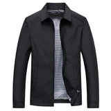Men's black weatherproof trench coat in size 2XL featuring a gingham lining, button closures, and a classic collar design, styled for a chic and formal look.