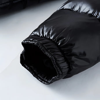 Men's black glossy hooded puffer jacket, insulated winter coat with full-zip front and side pockets.