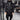 Men's black glossy puffer jacket with a stand-up collar, long sleeves, and insulated design, suitable for winter.