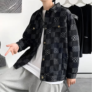 Men's black and grey checkered denim jacket featuring a classic collar, long sleeves, and a casual streetwear design.