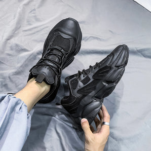 Men's black high-top sneakers featuring a stylish and durable design, depicted on a human leg, showing the breathable and comfortable material.