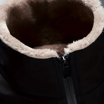 Men's black insulated waterproof thermal winter jacket with a hood and fur trim, featuring long sleeves and designed to keep warm in freezing temperatures.