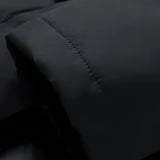 Men's black insulated waterproof thermal winter jacket with a hood, designed for cold weather protection, shown against a grey automotive-themed background.