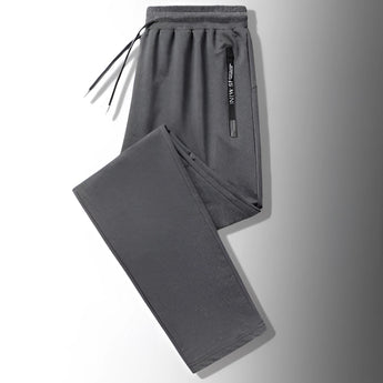 Men's dark gray joggers in size 4XL featuring a lightweight design and zippered pockets.