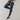 Men's black joggers featuring moisture-wicking fabric, designed with pockets, shown from waist down highlighting the active pants fit on legs and thighs.