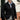 Men's black knit blazer styled as a designer formal cardigan, shown in Nero color and 3XL size. The blazer features a sleek design with a fashion-forward appeal, complemented by a white dress shirt underneath. The image highlights the texture of the knit fabric and the blazer's form-fitting silhouette, including the neckline, sleeves, and waist.