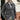 Men's gray knit blazer designed as a formal cardigan in a 3XL size, worn by a model with a beard. The blazer features a sleek and modern look, with elements of tartan pattern, highlighting fashion-forward outerwear with long sleeves and a tailored waist.