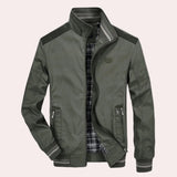 Men's green lightweight bomber jacket, featuring a casual zip-up design perfect for spring fashion. The jacket includes pockets and a collar, with long sleeves, shown in size 4XL.