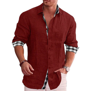 Men's black linen shirt with contrasting red cuffs, featuring roll-up sleeves and button-down collar, displayed on a mannequin model.