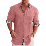 Men's black linen shirt with contrasting rose cuffs, featuring roll-up sleeves and a classic collar, displayed on a mannequin.
