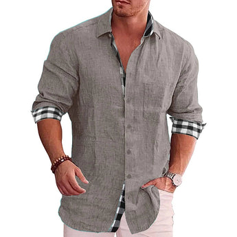 Men's black linen shirt with contrast cuffs, featuring roll-up sleeves and styled with a watch.
