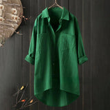 Men's green linen shirt in size 5XL hanging on a clothes hanger, featuring long sleeves, a classic collar, and a lightweight, breathable fabric ideal for eco-friendly fashion.