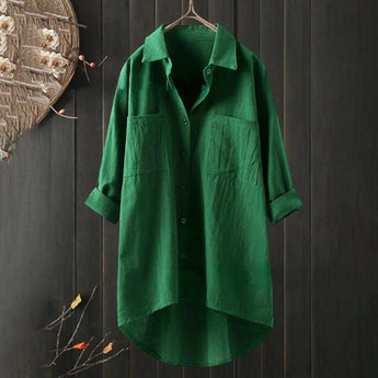 Men's green linen shirt in size 5XL hanging on a clothes hanger, featuring long sleeves, a classic collar, and a lightweight, breathable fabric ideal for eco-friendly fashion.