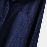 Men's black linen shirt featuring a classic collar and long sleeves, made from lightweight and breathable fabric for an eco-friendly and comfortable wear.