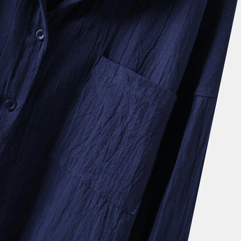 Men's black linen shirt featuring a classic collar and long sleeves, made from lightweight and breathable fabric for an eco-friendly and comfortable wear.