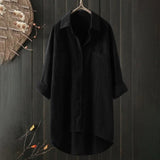 Men's black linen shirt hanging on a clothes hanger, featuring long sleeves and a collar. The shirt is lightweight, breathable, and eco-friendly, and is available in size 5XL.