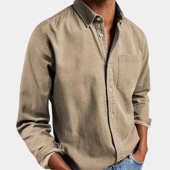 Men's black long sleeve casual shirt featuring a stylish design with a collar and comfortable fit, displayed on a mannequin or model showcasing the shoulder and elbow areas.