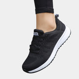 Men's black mesh running shoes with a lightweight and breathable design, featuring synthetic rubber soles and stylish fashion patterns, suitable for outdoor and athletic activities.