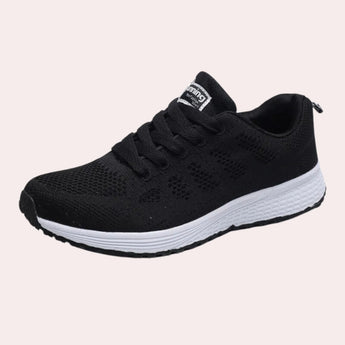 Men's black mesh running shoes with a lightweight and breathable design, featuring a comfortable fit suitable for outdoor activities. The shoe is primarily black with a subtle grey pattern, embodying an athletic and sporty look.