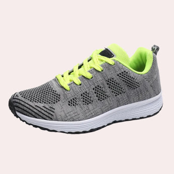 Men's black mesh running shoes in a green variant, featuring a lightweight and breathable design with a comfortable fit, suitable for outdoor activities.