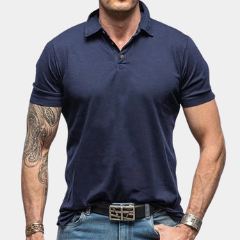 Men's marine blue muscle-fit polo shirt in size 2XL, featuring a stretch fabric for athletic wear, with a clean collar and short sleeves.