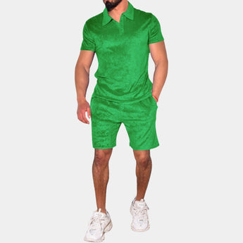 Men's green polo and shorts set in a 3XL size, featuring a slim fit design with breathable fabric suitable for summer wear. The outfit is modeled by a person standing, showcasing the short sleeves and overall fit.