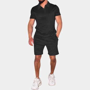 Men's black polo and shorts set in size 3XL, featuring a slim fit design with breathable material, showcasing the shorts and polo with visible sleeves and waist area.