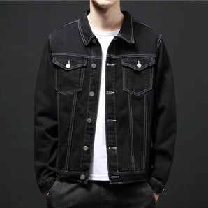 Men's black slim fit trucker denim jacket featuring a classic collar, button closure, and long sleeves, showcasing a lightweight and versatile design suitable for various styles.