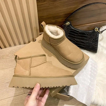 Men's brown slip-on winter boots with fleece lining, shown in size 42, featuring a durable and non-slip sole.
