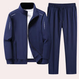 Men's blue tracksuit set in size 4XL featuring a comfortable jersey material with long sleeves, a casual collar, and a button-up front, ideal for winter comfort and sportswear.