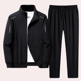Men's black winter tracksuit set in size 4XL featuring a sporty design with long sleeves, a high collar, and a comfortable fit suitable for both casual and athletic wear.