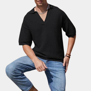 Men's black V-neck knit polo shirt in XL size, featuring a breathable and casual design suitable for summer wear, displayed on a person wearing jeans.